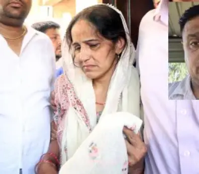 ASI_Sandeep_Kumar_above_his_wife_Santosh.webp
